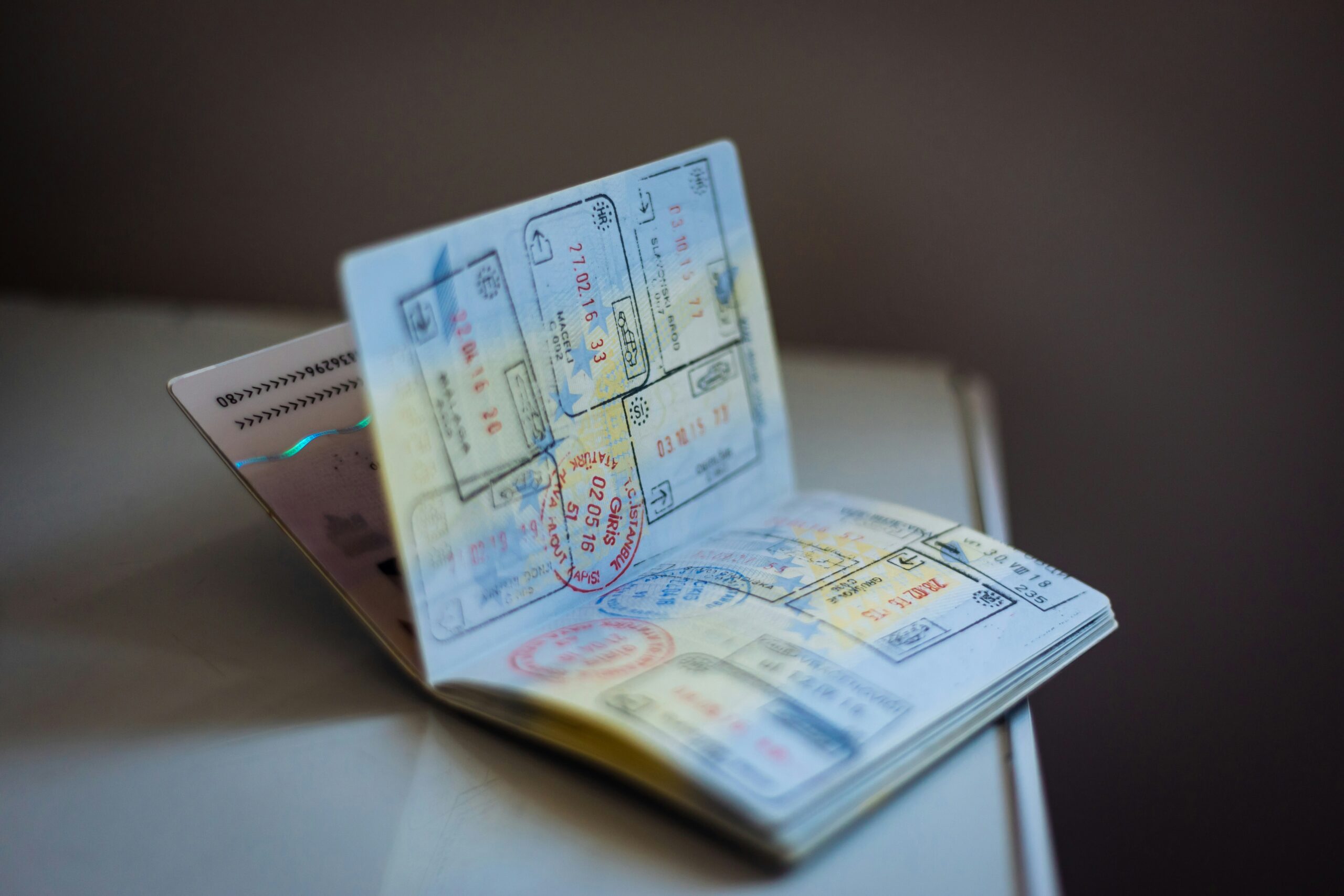Open passport with travel stamps illustrating the impact of Uruguay passport changes on international travelers.